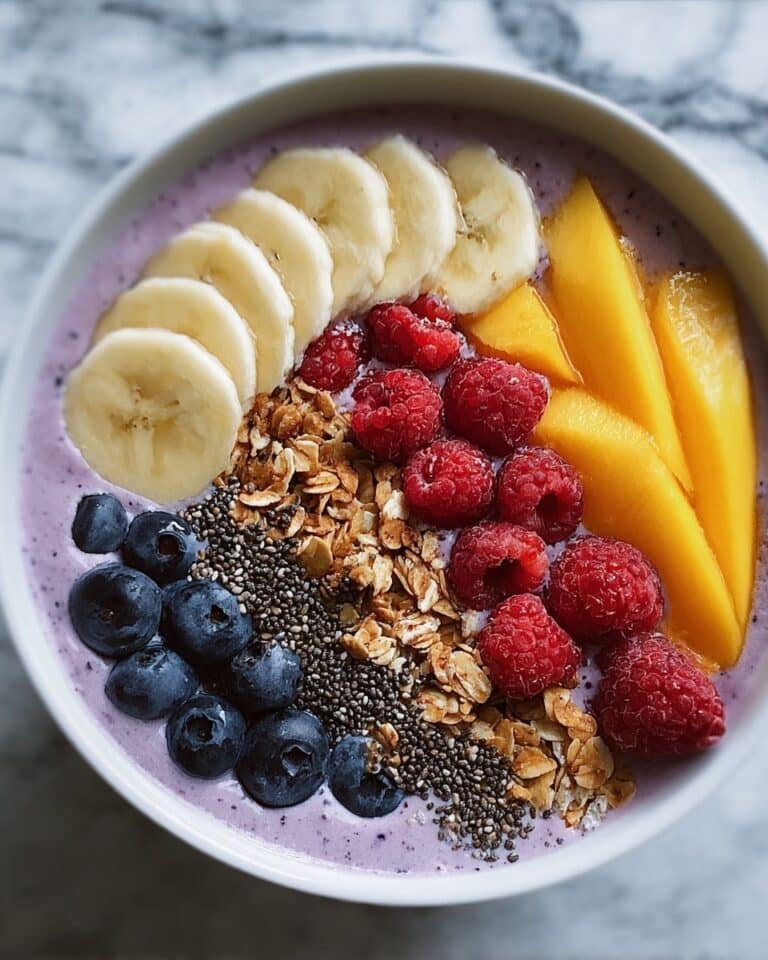 Berry Banana Smoothie Bowl with Granola and Fresh Fruit Recipe